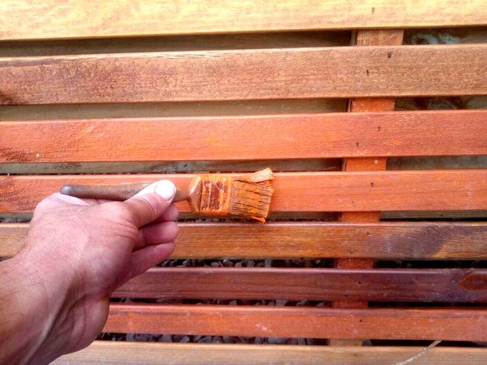 Painting a slatted fence
