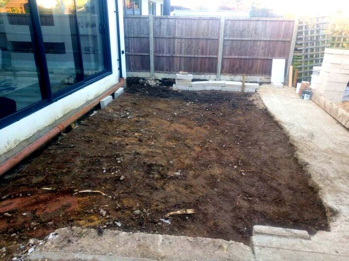 Digging out a raised patio